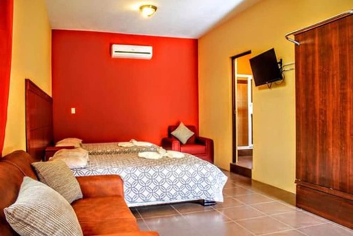 Imagen de la habitación del Hotel Grand Caporal. Foto 12