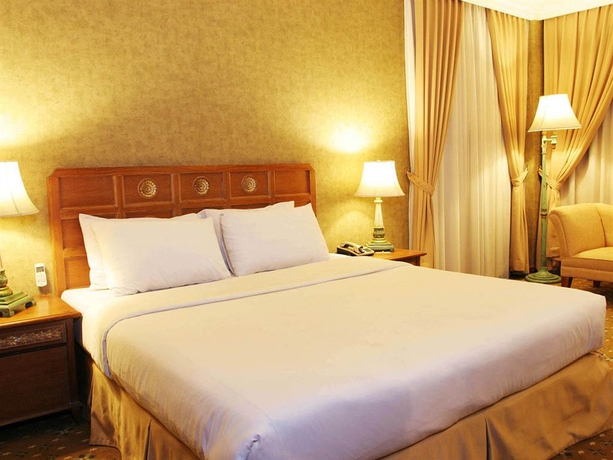 Imagen de la habitación del Hotel Grand Cemara. Foto 8