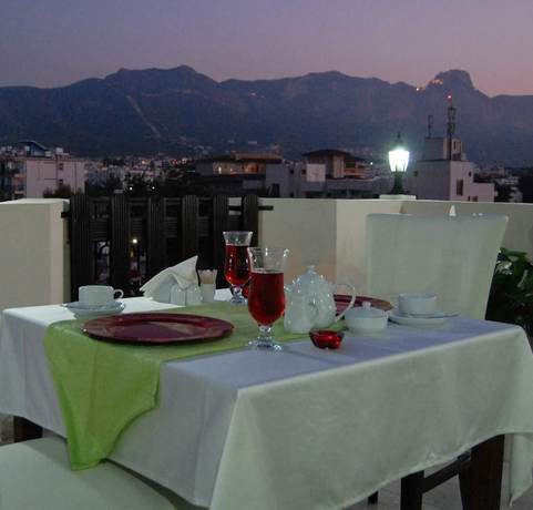 Imagen del bar/restaurante del Hotel Grand Center Boutique. Foto 2