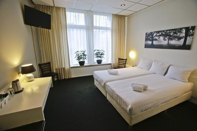 Imagen de la habitación del Hotel Grand Central, Rotterdam. Foto 4