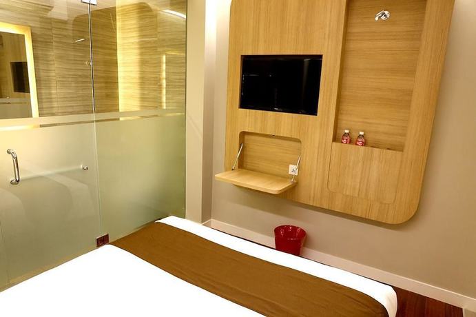 Imagen de la habitación del Hotel Grand Citihub At Panakkukang. Foto 2