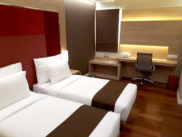 Imagen de la habitación del Hotel Grand Citihub At Panakkukang. Foto 6