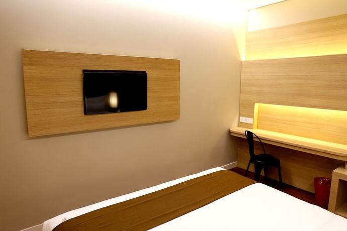 Imagen de la habitación del Hotel Grand Citihub At Panakkukang. Foto 11