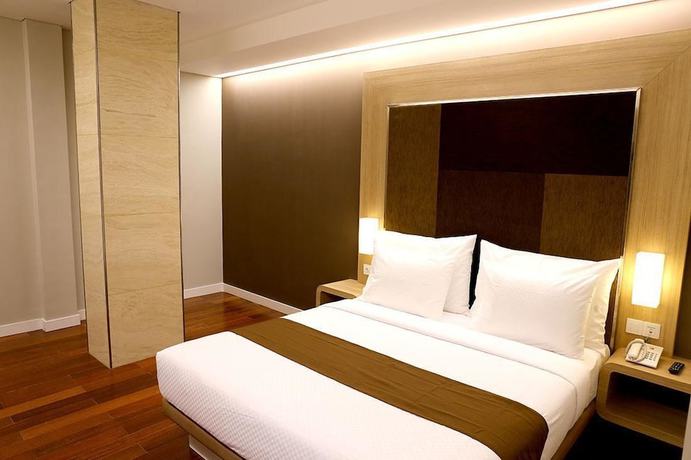 Imagen de la habitación del Hotel Grand Citihub At Panakkukang. Foto 14
