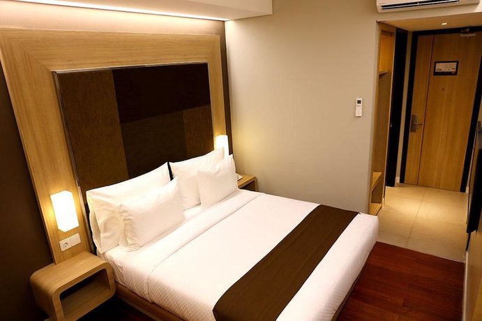 Imagen de la habitación del Hotel Grand Citihub At Panakkukang. Foto 15