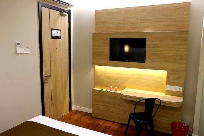 Imagen de la habitación del Hotel Grand Citihub At Panakkukang. Foto 16