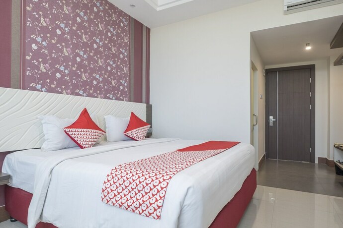 Imagen de la habitación del Hotel Grand Citra Makassar. Foto 8