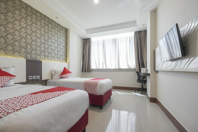 Imagen de la habitación del Hotel Grand Citra Makassar. Foto 9