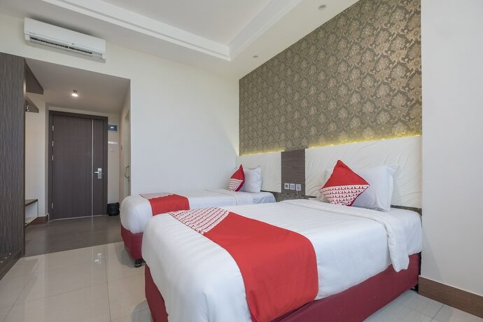 Imagen de la habitación del Hotel Grand Citra Makassar. Foto 10