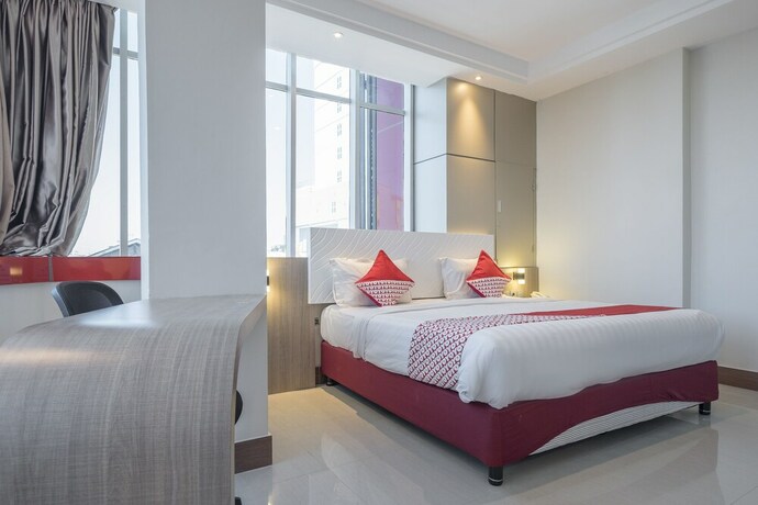 Imagen de la habitación del Hotel Grand Citra Makassar. Foto 11