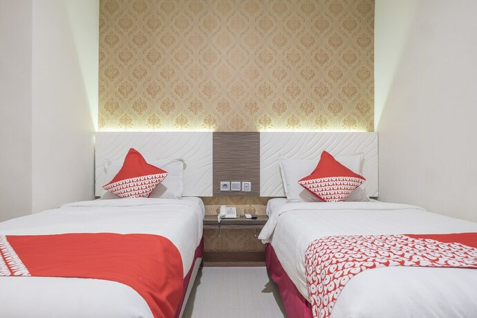 Imagen de la habitación del Hotel Grand Citra Makassar. Foto 12