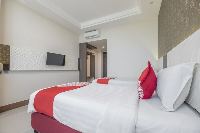 Imagen de la habitación del Hotel Grand Citra Makassar. Foto 15