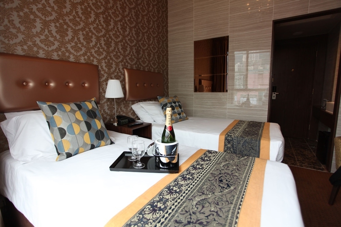 Imagen de la habitación del Hotel Grand City, Distrito Oeste. Foto 6