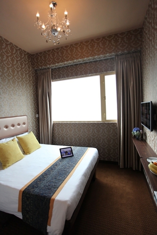 Imagen de la habitación del Hotel Grand City, Distrito Oeste. Foto 7