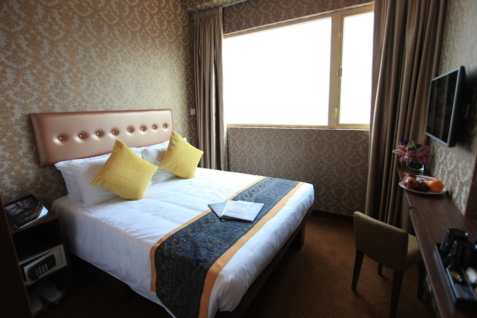 Imagen de la habitación del Hotel Grand City, Distrito Oeste. Foto 10