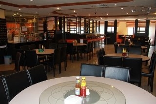 Imagen del bar/restaurante del Hotel Grand City, GADONG. Foto 6