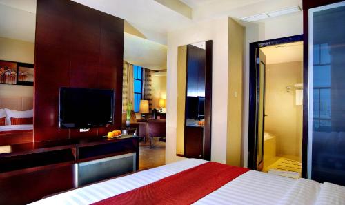 Imagen de la habitación del Hotel Grand City Hall Hotel & Serviced Residences. Foto 6