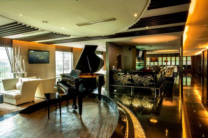 Imagen del bar/restaurante del Hotel Grand City Hall Hotel & Serviced Residences. Foto 3