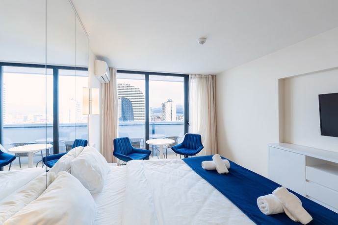 Imagen de la habitación del Hotel Grand City Real Estate. Foto 2