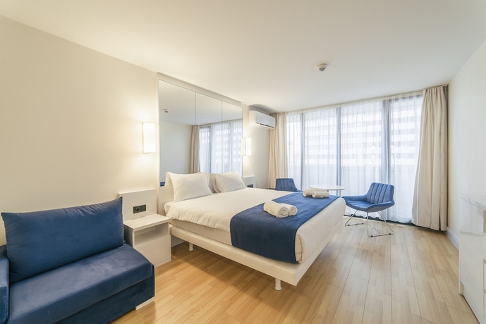 Imagen de la habitación del Hotel Grand City Real Estate. Foto 13