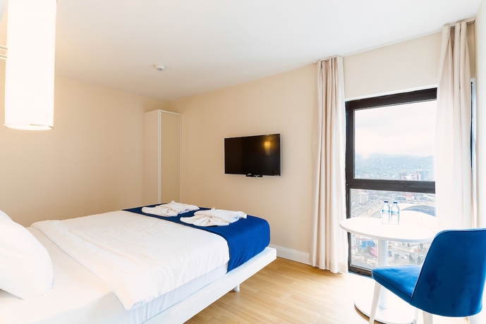 Imagen de la habitación del Hotel Grand City Real Estate. Foto 17