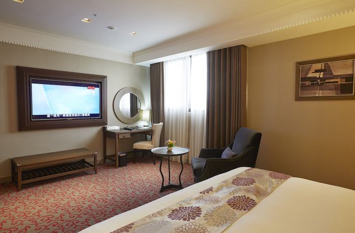 Imagen de la habitación del Hotel Grand City, Taichung. Foto 2