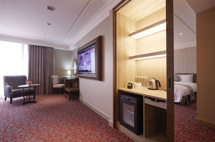 Imagen de la habitación del Hotel Grand City, Taichung. Foto 4