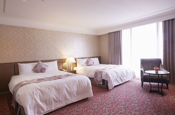 Imagen de la habitación del Hotel Grand City, Taichung. Foto 8