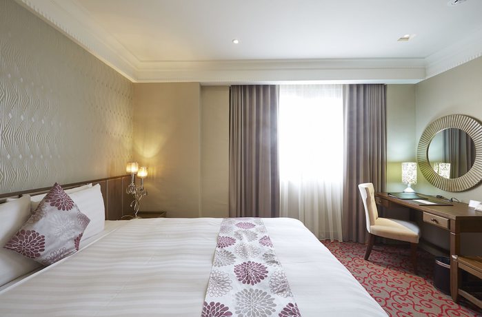 Imagen de la habitación del Hotel Grand City, Taichung. Foto 9