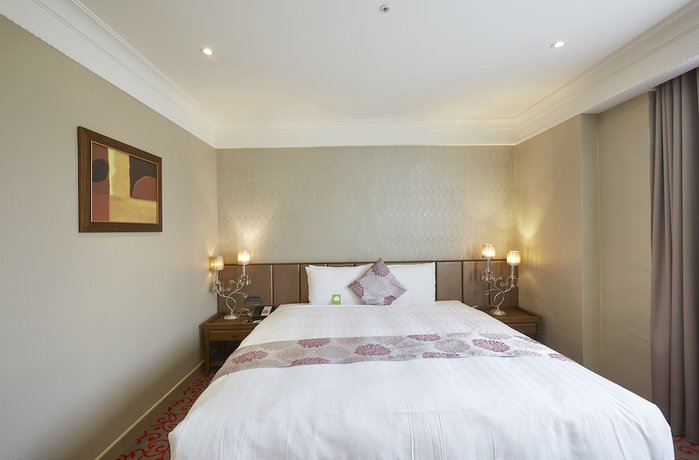 Imagen de la habitación del Hotel Grand City, Taichung. Foto 11