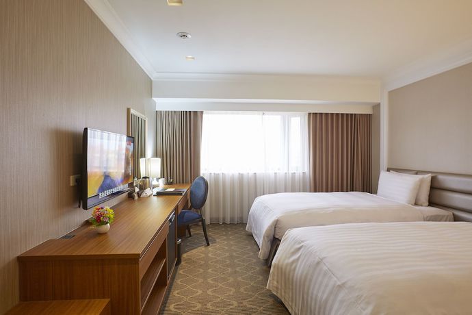 Imagen de la habitación del Hotel Grand City, Taichung. Foto 13
