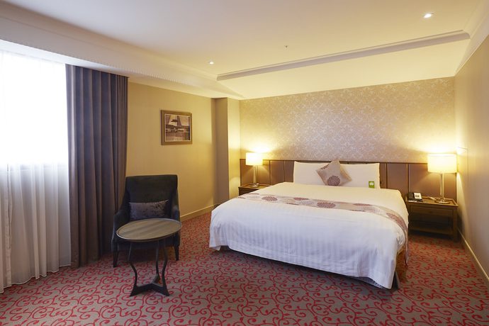 Imagen de la habitación del Hotel Grand City, Taichung. Foto 16