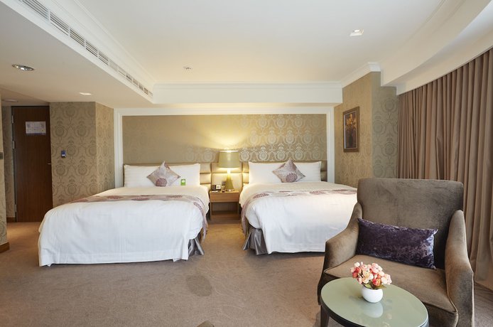 Imagen de la habitación del Hotel Grand City, Taichung. Foto 19