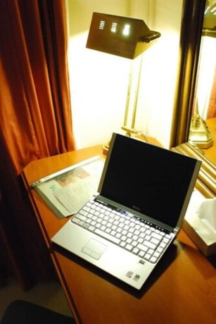 Imagen de la habitación del Hotel Grand Coastal. Foto 20