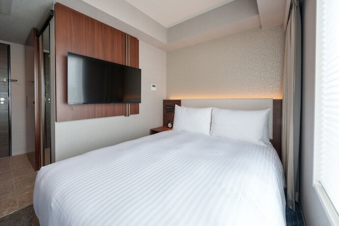 Imagen de la habitación del Hotel Grand Consort Naha. Foto 16