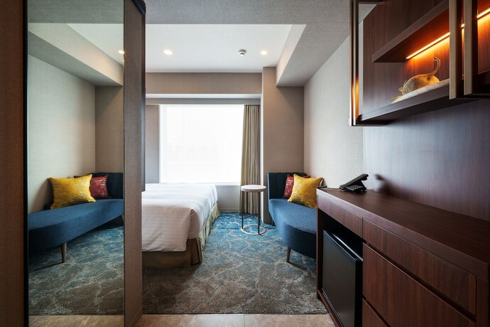 Imagen de la habitación del Hotel Grand Consort Naha. Foto 18