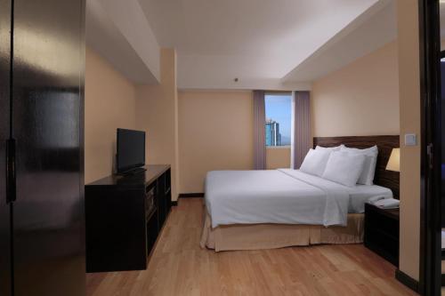Imagen de la habitación del Hotel Grand Dafam Braga Bandung. Foto 3