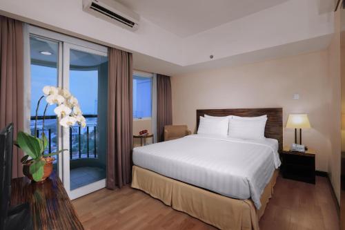 Imagen de la habitación del Hotel Grand Dafam Braga Bandung. Foto 4