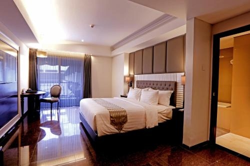 Imagen de la habitación del Hotel Grand Dafam Rohan Jogja. Foto 8