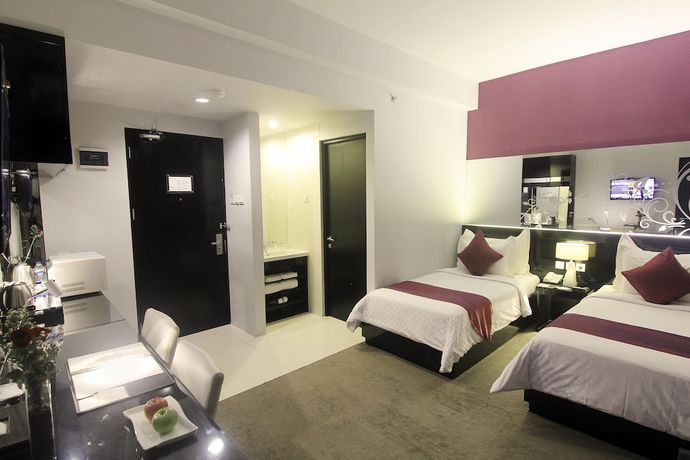 Imagen de la habitación del Hotel Grand Darmo Suite By Amithya. Foto 7