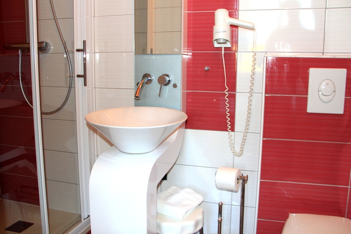 Imagen de la habitación del Hotel Grand De La Basilique. Foto 2