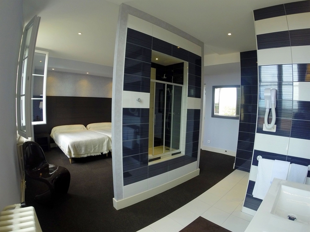 Imagen de la habitación del Hotel Grand De La Basilique. Foto 6