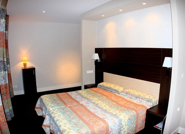 Imagen de la habitación del Hotel Grand De La Basilique. Foto 7