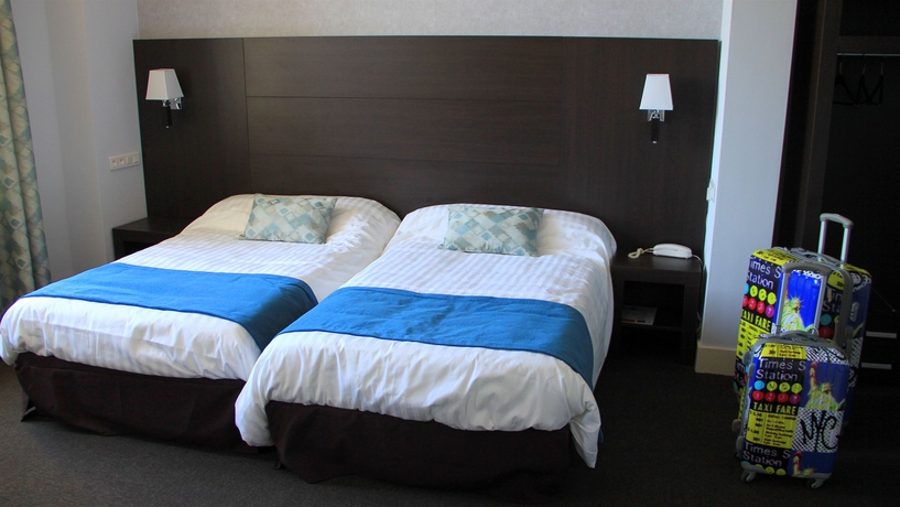 Imagen de la habitación del Hotel Grand De La Basilique. Foto 12