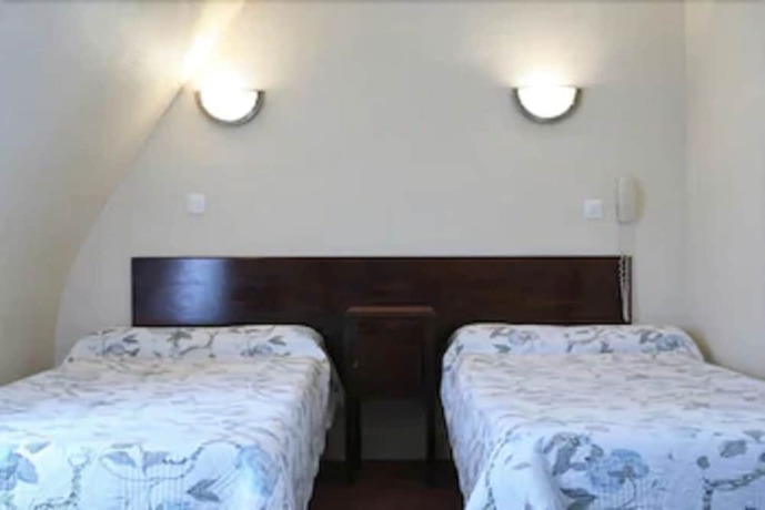 Imagen de la habitación del Hotel Grand De L'europe, Gare du Nord. Foto 4