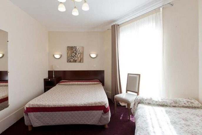 Imagen de la habitación del Hotel Grand De L'europe, Gare du Nord. Foto 5