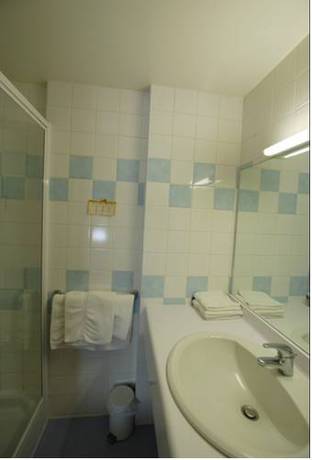 Imagen de la habitación del Hotel Grand De L'europe, Langres. Foto 5