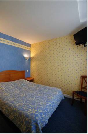 Imagen de la habitación del Hotel Grand De L'europe, Langres. Foto 10
