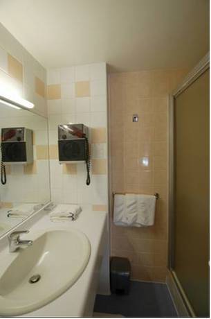Imagen de la habitación del Hotel Grand De L'europe, Langres. Foto 14