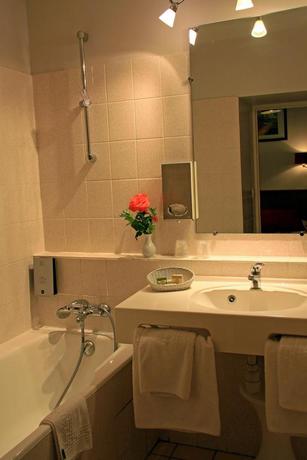 Imagen de la habitación del Hotel Grand De Lyon. Foto 5